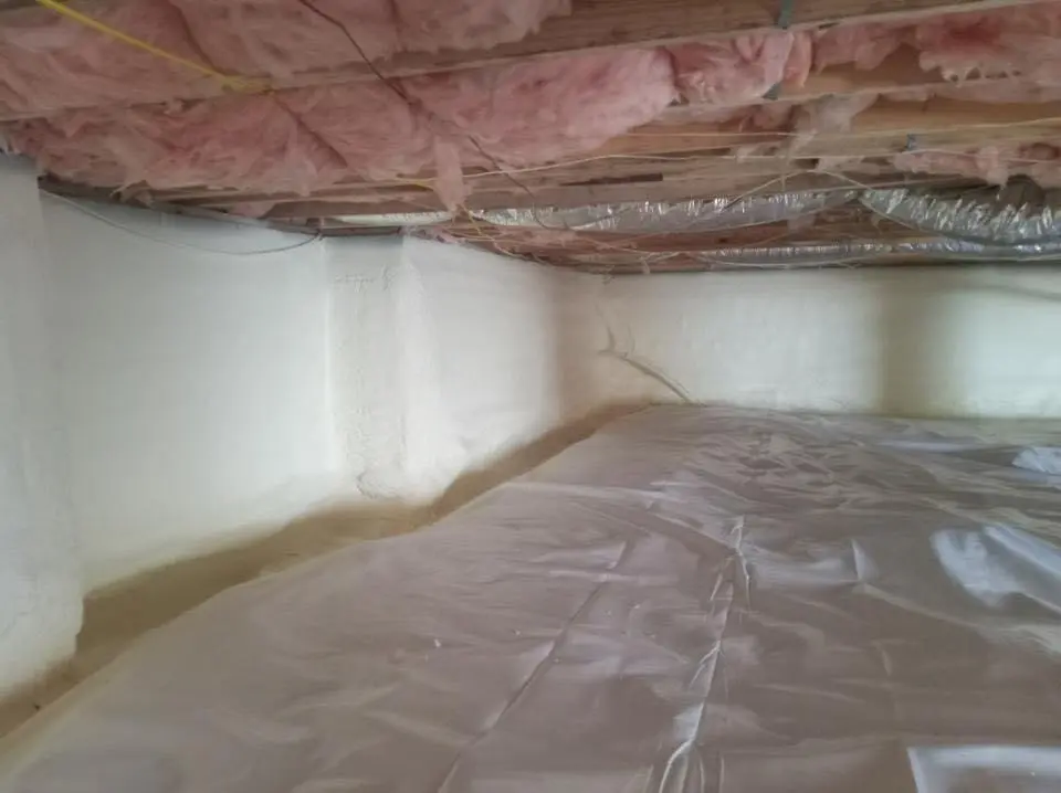 Crawl space encapsulation with closed-cell spray foam for Flat Roof Repair in Rensselaer